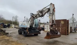 
										Excavadora sobre llantas Hitachi ZX140W-3 año 2010 completo									