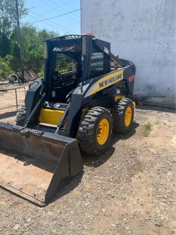 Minicargador New Holland L185 año 2009
